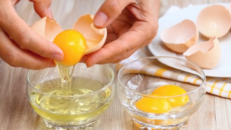 Person separating egg whites