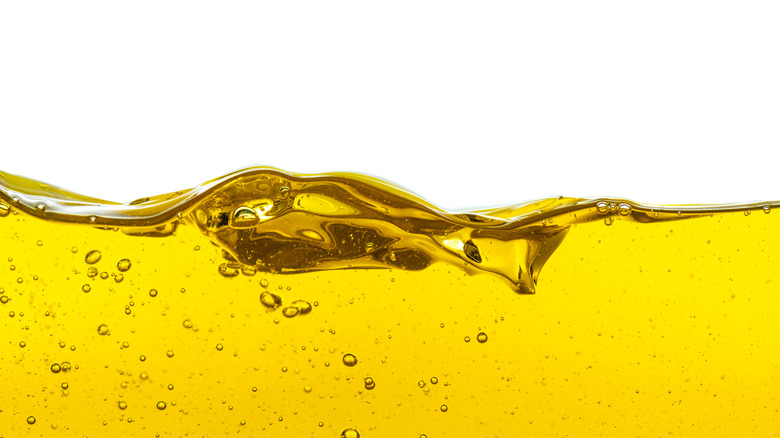 Olive oil on white background