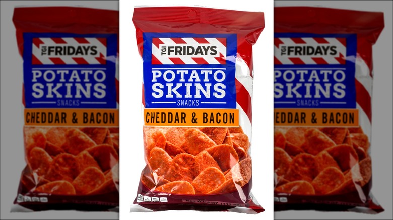 A package of T.G.I. Friday's Cheddar & Bacon Potato Skins Snack Chips, seen on a white background