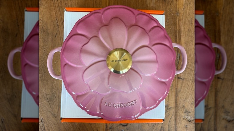 A Le Creuset petal braiser in Berry, so named for the lid that looks like a flower