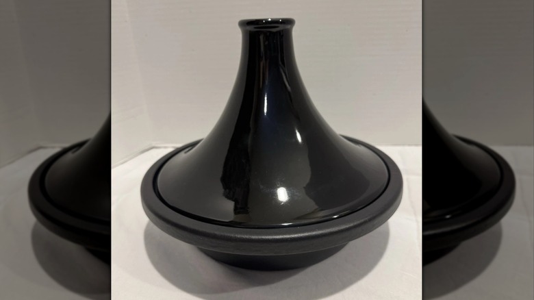 A Le Creuset tagine pot in Black Onyx