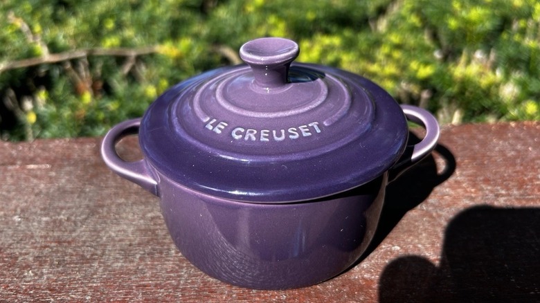 A Le Creuset round mini cocotte in Cassis