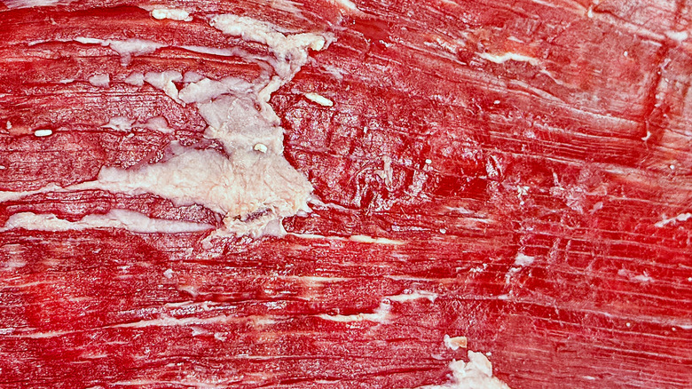 A closeup view of the grain of a flank steak