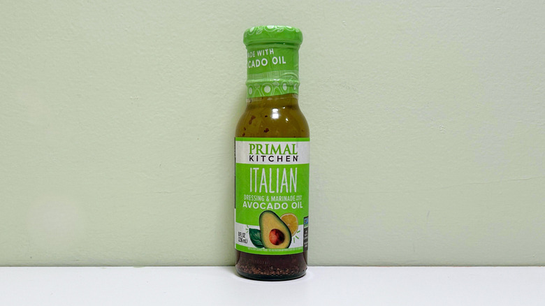 A bottle of Primal Kitchen Italian Dressing