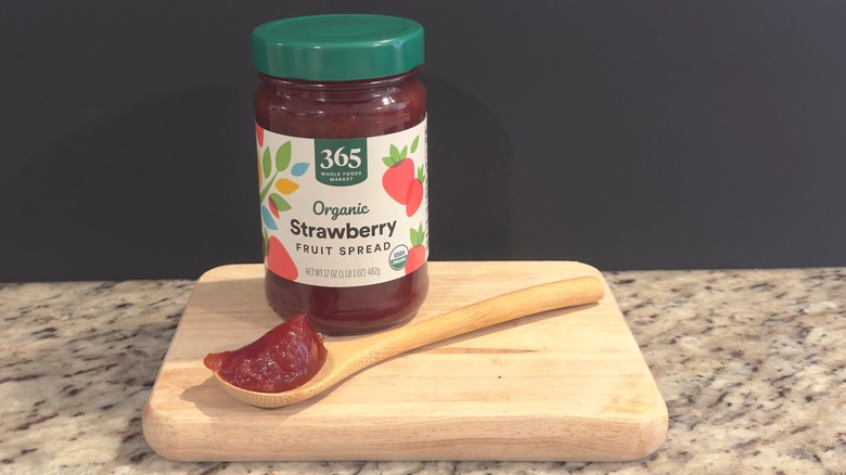 Jar of 365 Fruit Spread with sample on spoon