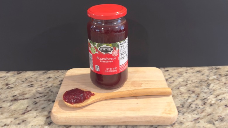 Jar of Berryhill Strawberry Preserves with sample on spoon