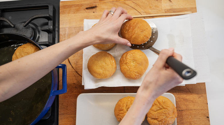 Removing donuts from oil