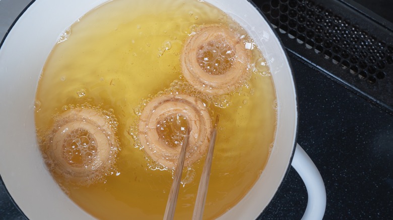 Flipping donut with chopsticks