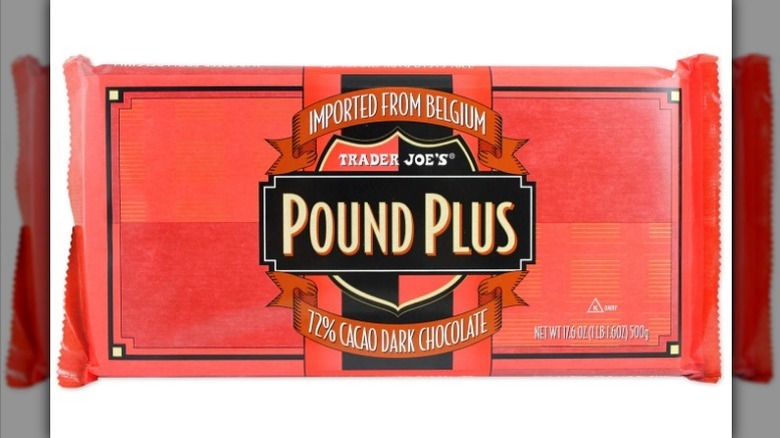 Dark chocolate Pound Plus bar with a red label on a white background.