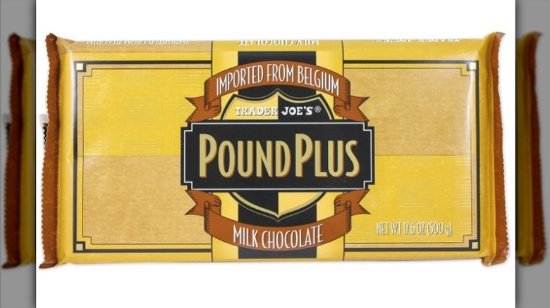 Milk chocolate Pound Plus bar with gold label on white background