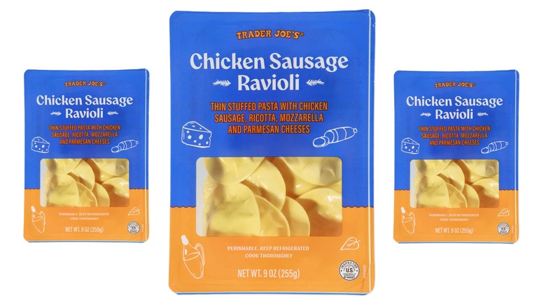 3 blue and orange packages of Trader Joe's chicken sausage ravioli against a white background