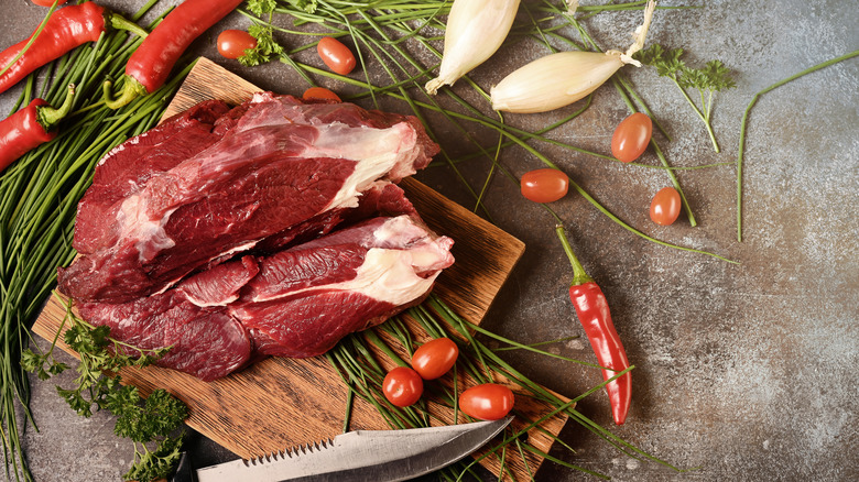 Elk meat and fresh vegetables