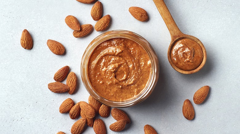 jar of reddish-brown almond butter