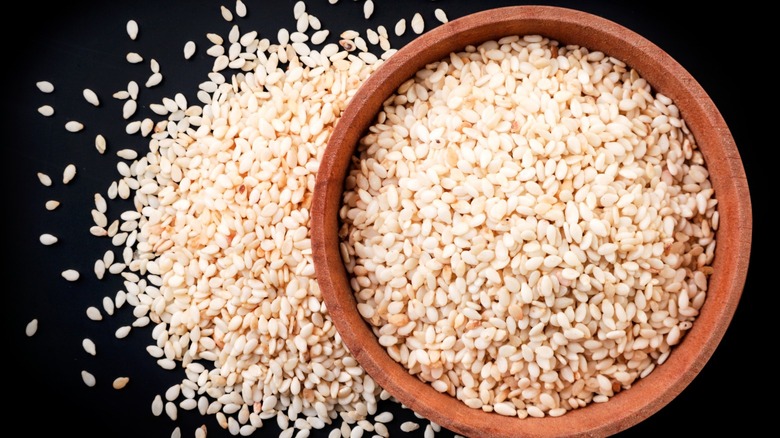 Bowl of white sesame seeds
