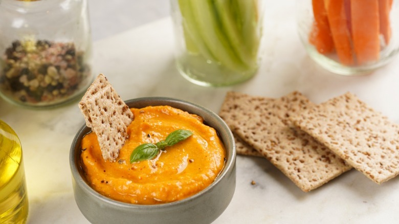 Sesame seed crackers with orange dip