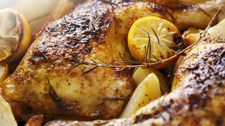 roast chicken with lemon slices