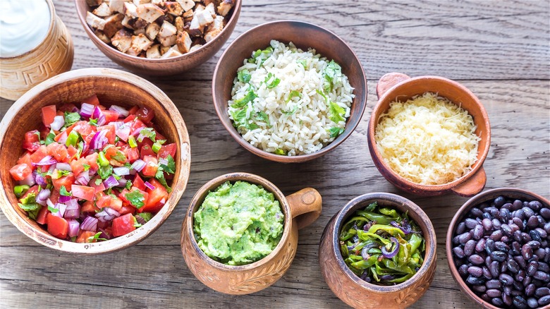 burrito toppings in a line