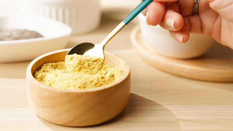Spoon of nutritional yeast