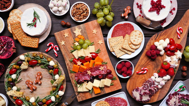 Christmas grazing board with charcuterie, nuts, and cookies