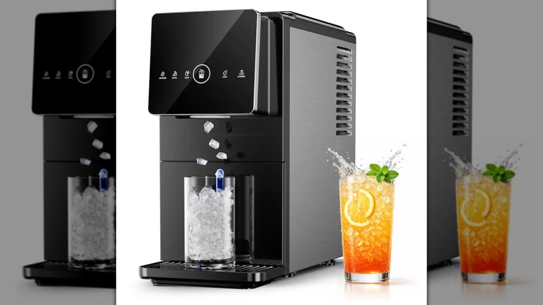 Ecozy Chillio Nugget Ice Maker on a white background, next to an orange drink