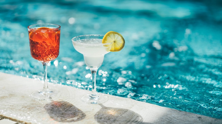 Two cocktails by the pool