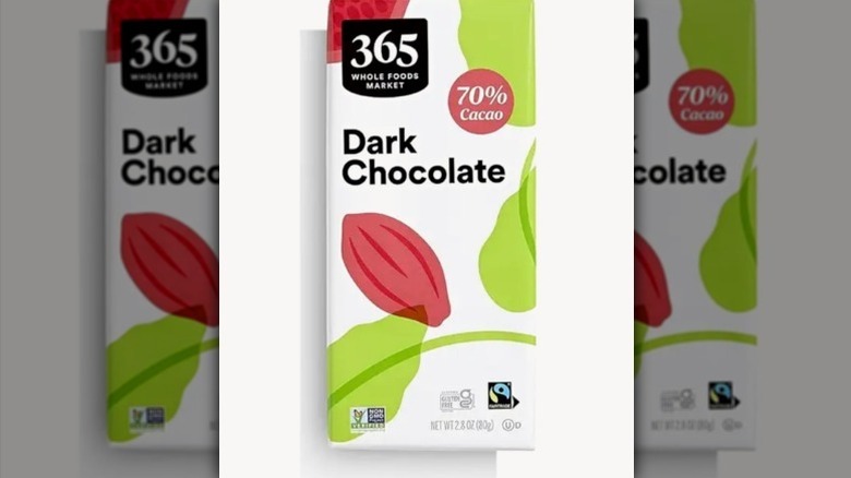 365 dark chocolate bar with a red, green, and white label on white background