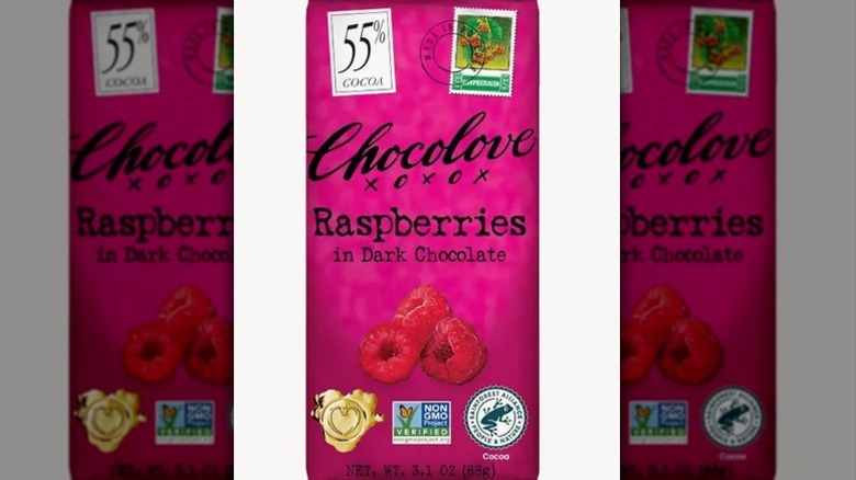 Chocolove raspberry dark chocolate in a bright magenta wrapper on white background