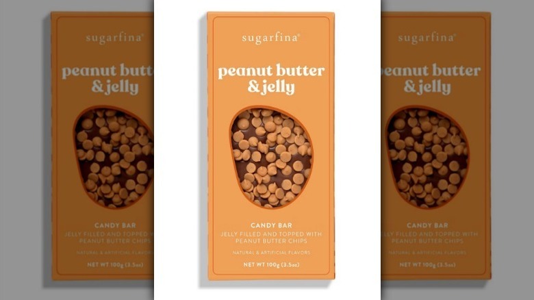 Sugarfina peanut butter and jelly candy bar in an orange package on white background