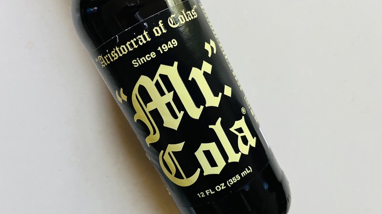 Glass bottle of cola