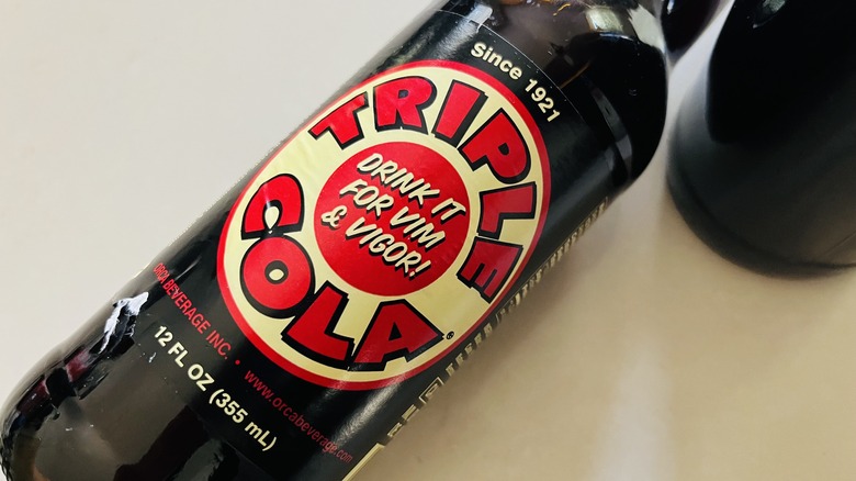 Glass bottle of cola