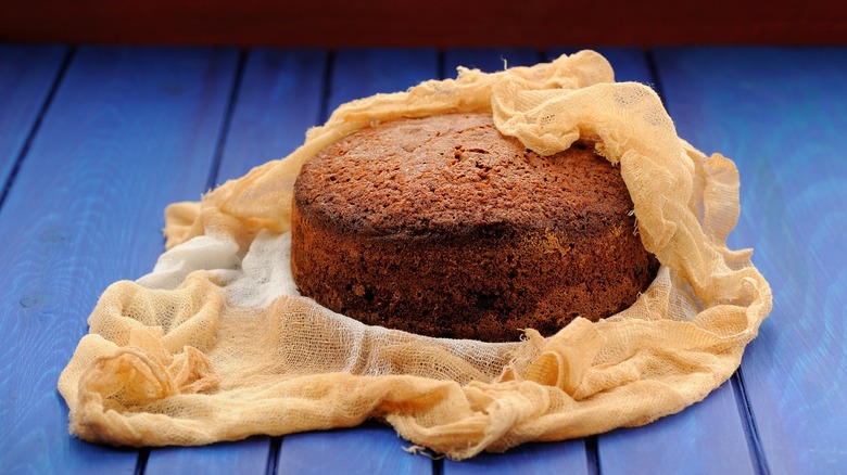 Fruitcake with cheesecloth