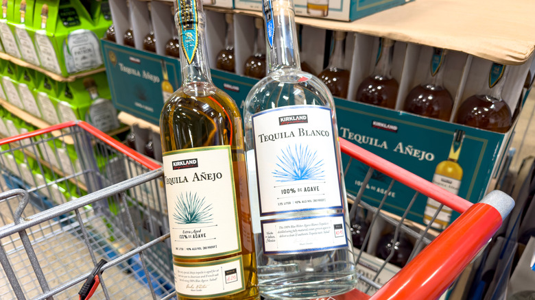 Bottles of Kirkland tequila in shopping cart