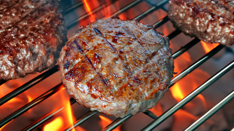 Burgers cooking on grill
