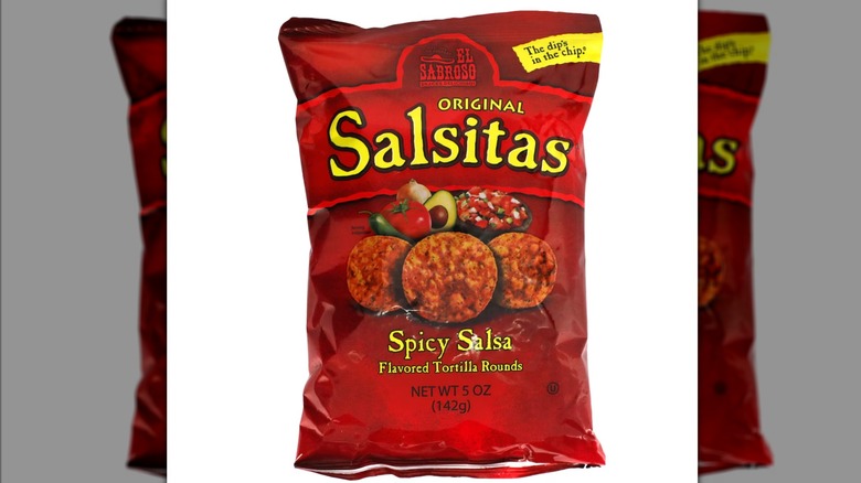 A red and yellow bag of El Sabroso Original Salsitas Spicy Salsa Tortilla Rounds against a white background.