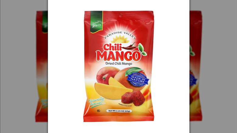 A bag of Paradise Valley Dried Chili Mango in a red bag.