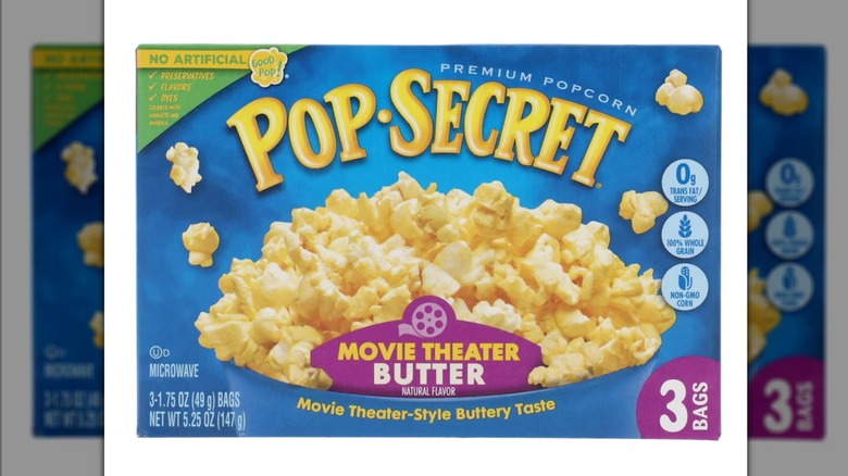 A box of Pop Secret Popcorn, Movie Theater Butter flavor against a white background.
