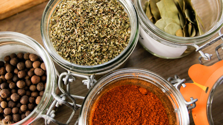 Open jars of spices and herbs