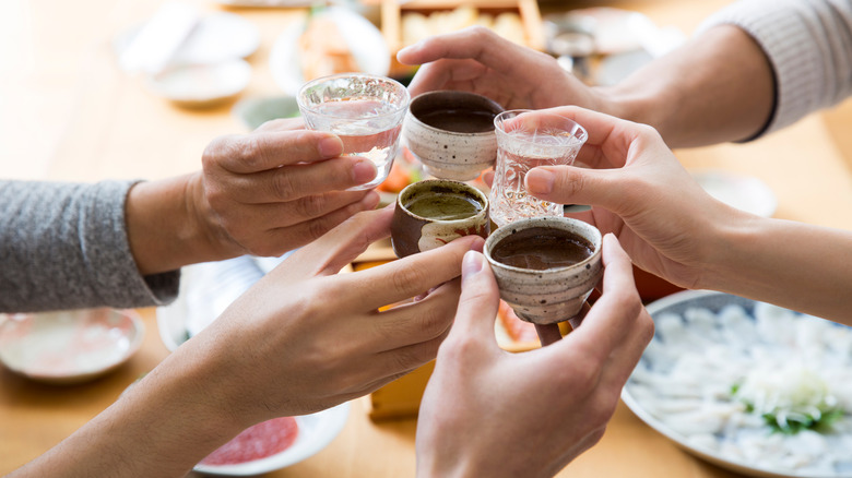 A number of sake cups
