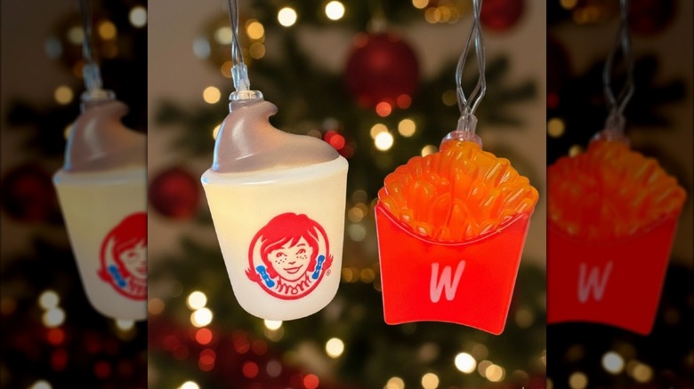 Two glass string lights shaped like Wendy's fries and a Frosty