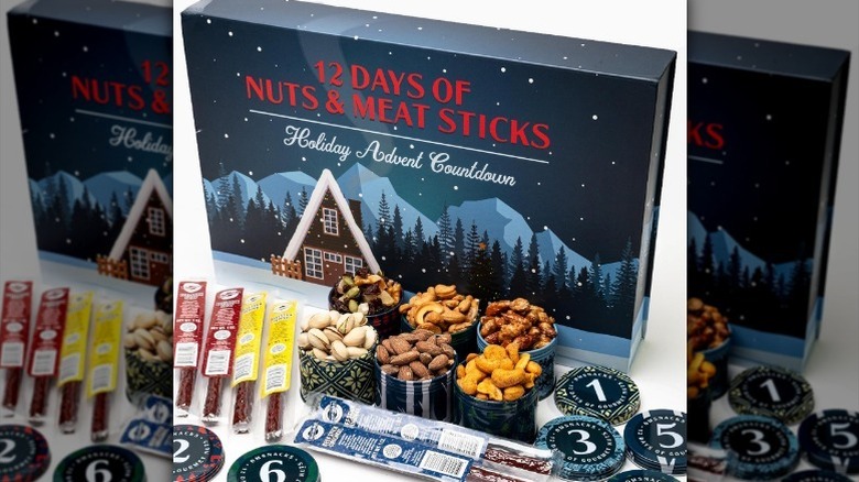 Nuts and meat advent calendar on white background