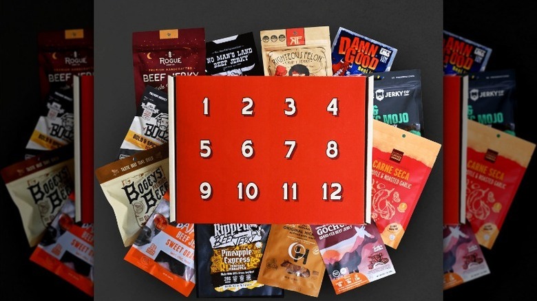 Beef jerky advent calendar with contents on gray background