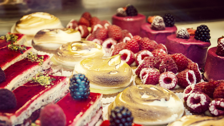 Rows of French desserts in a patisseries case