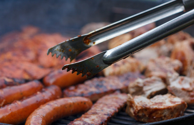 https://www.thedailymeal.com/img/gallery/14-grilling-tools-dad-absolutely-needs-this-fathers-day/INTRO-long_handed_tongs-shutterstock.jpg