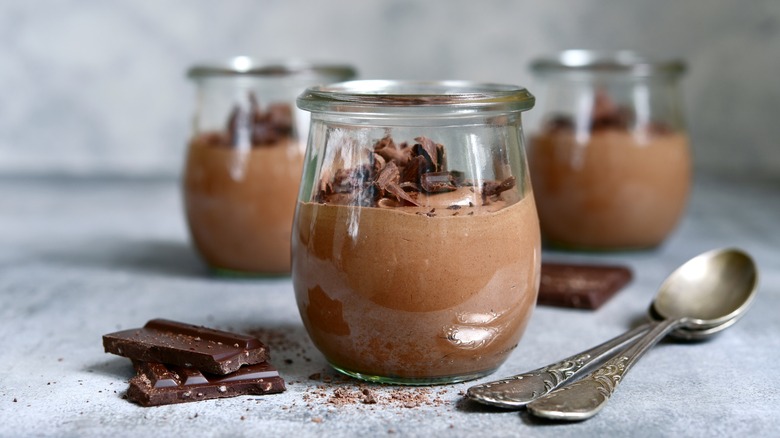 Three chocolate pudding cups