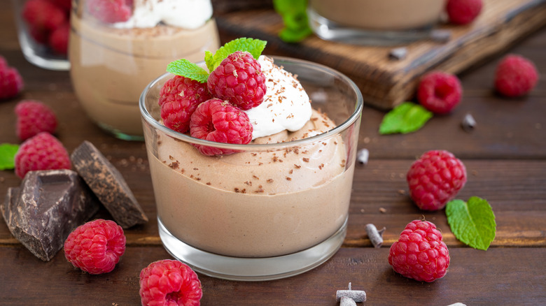 Pudding with whipped cream and berries