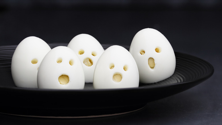 hard-boiled eggs with faces