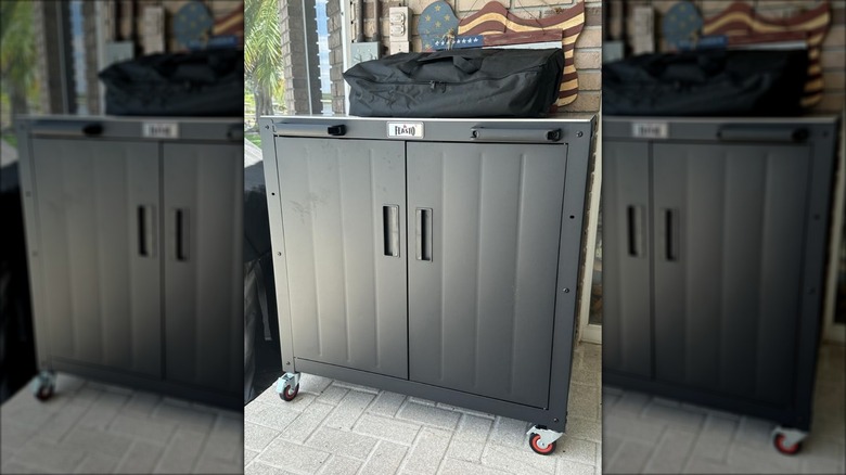 Feasto movable stainless steel cabinet island on a porch