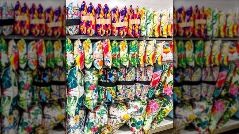 Bright and colorful decorative pillows on shelves