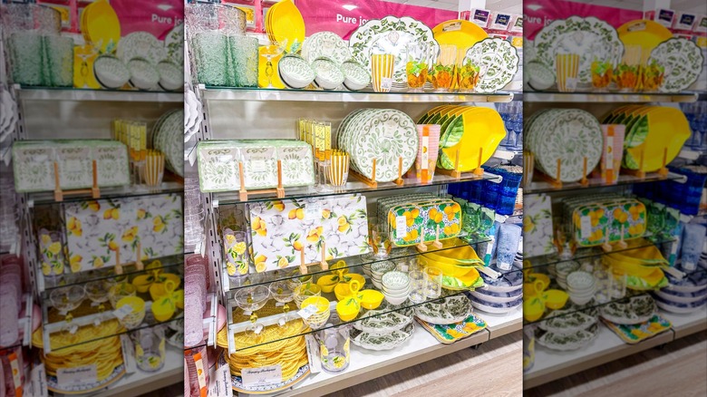Lemon and green scroll tableware on shelves