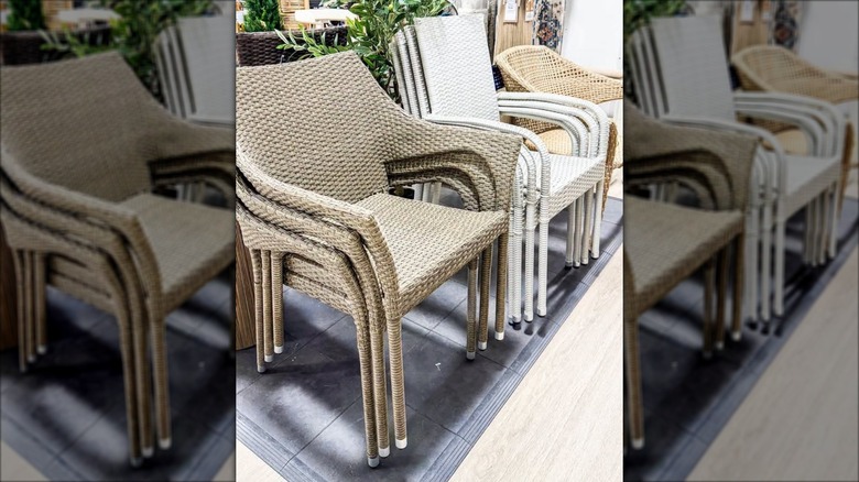 Display of wicker patio dining chairs